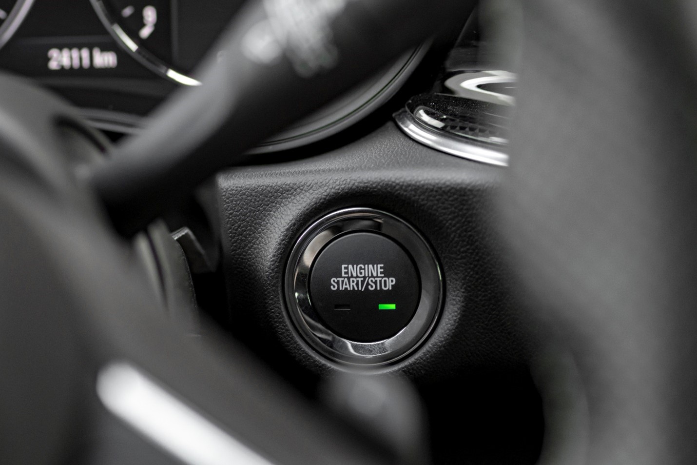Interior engine start and stop button in a car.jpg