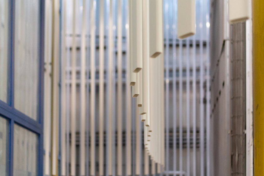 a metal gate with bars