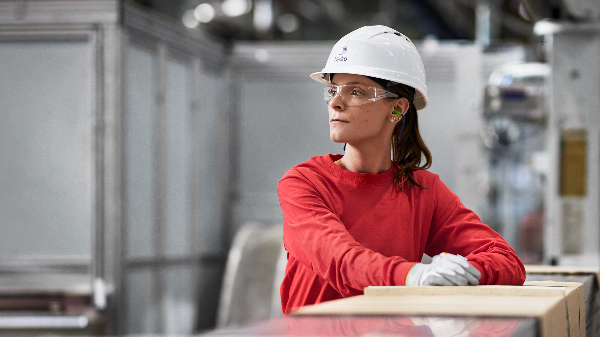 a woman wearing a hard hat