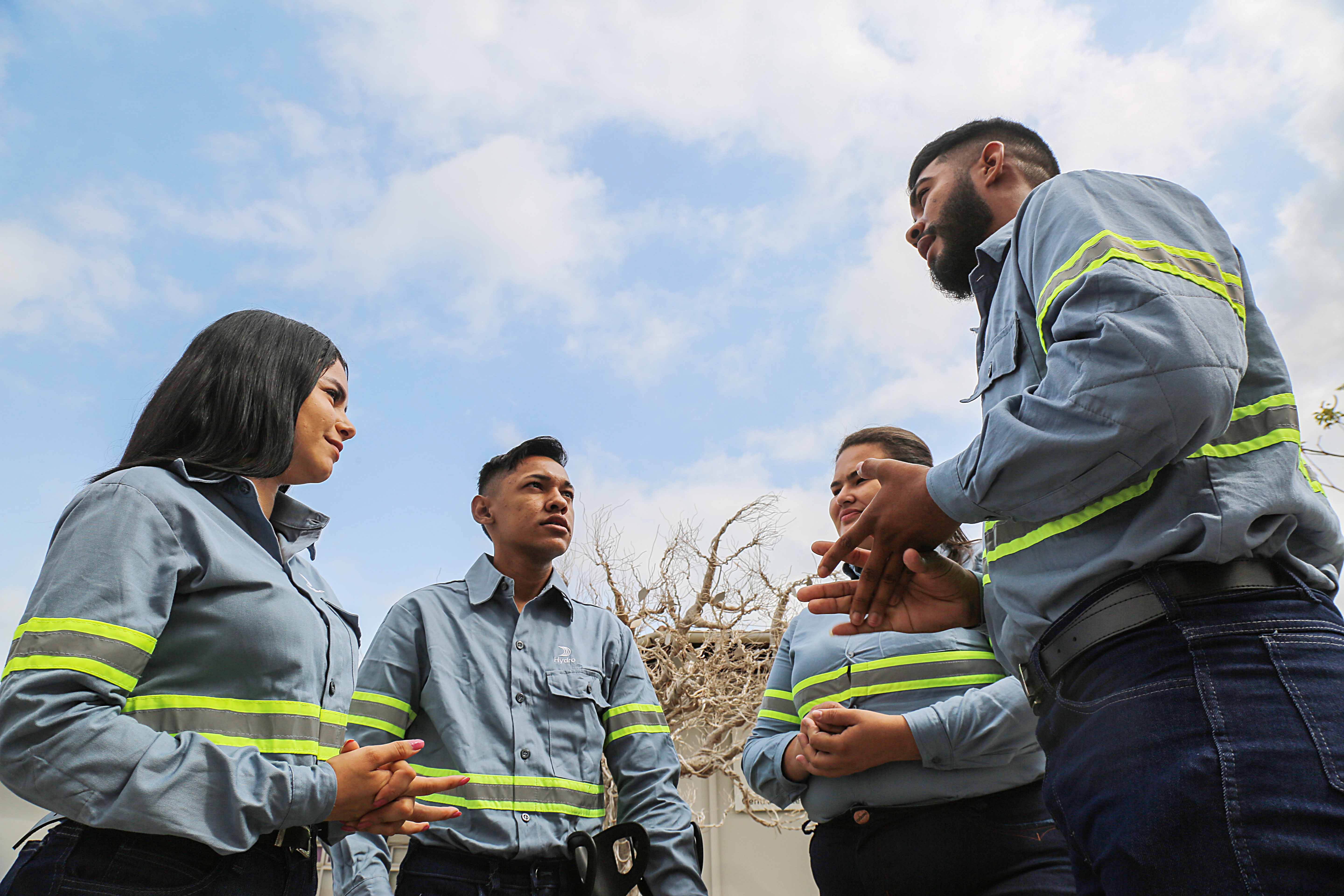 a group of men standing outside