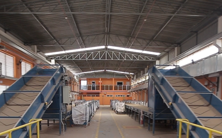 a warehouse with blue and yellow walls