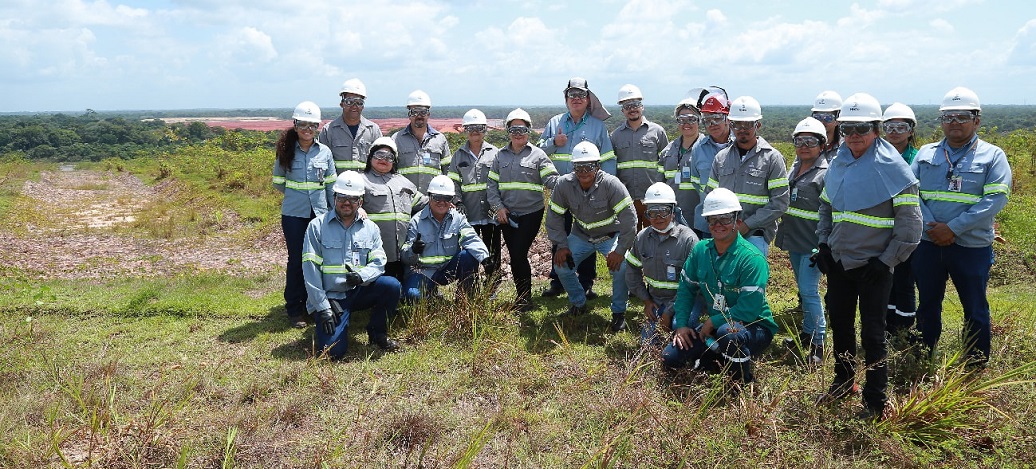 a group of people wearing white helmets