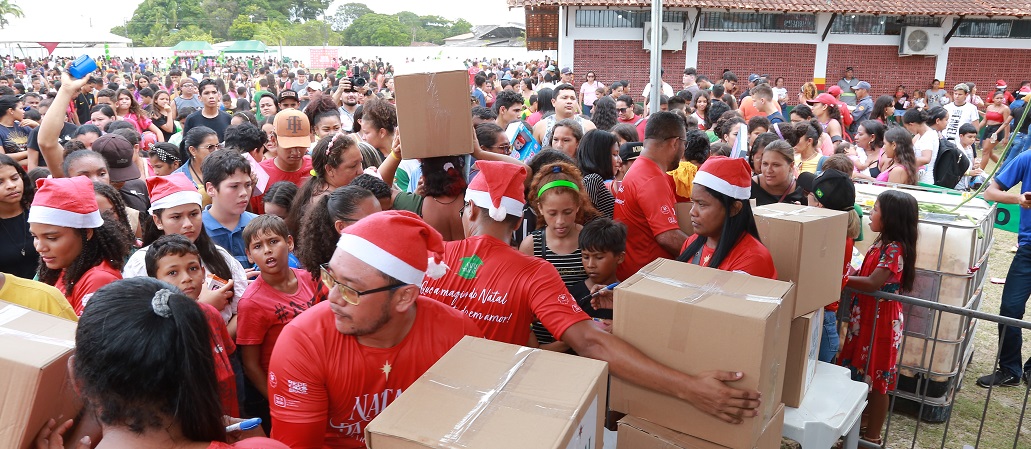 a group of people wearing red shirts and hats